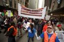 Demonstrators march during a Chicago Teachers Union protest in Chicago
