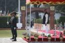 India's Prime Minister Narendra Modi watches a guard of honour upon his arrival for the 18th South Asian Association for Regional Cooperation (SAARC) summit in Kathmandu