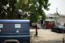 Nigerian police, part of the joint forces in Borno state, patrol in Maiduguri on June 5, 2013
