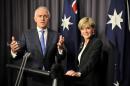Newly elected Australian Prime Minister Malcolm Turnbull (L) speaks at a press conference with deputy leader Julie Bishop (R) after ousting Tony Abbott in a leadership ballot in Canberra on September 14, 2015