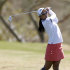 Ai Miyazato, of Japan, follows through on her approach shot from the third fairway during the first round of the Founders Cup golf tournament on Thursday, March 14, 2013, in Scottsdale, Ariz. (AP Photo/Paul Connors)