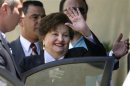 Lucia Hiriart, the widow of Former Chilean dictator Augusto Pinochet, waves after a mass in Santiago