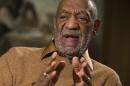 In this Nov. 6, 2014 file photo, entertainer Bill Cosby gestures during an interview about the upcoming exhibit, "Conversations: African and African-American Artworks in Dialogue, " at the Smithsonian's National Museum of African Art, in Washington. A Southern California woman has sued Cosby, claiming the comedian molested her around 1974 when she was 15 years old. Judith Huth claims in the sexual battery lawsuit filed Tuesday, Dec. 2, 2014. in Los Angeles that the molestation occurred in a bedroom of the Playboy Mansion. (AP Photo/Evan Vucci, File)