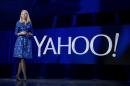 FILE - In this Jan. 7, 2014 file photo, Yahoo President and CEO Marissa Mayer speaks during the International Consumer Electronics Show in Las Vegas. Yahoo Inc. on Tuesday, April 21, 2015, reported first-quarter net income of $21.2 million. On a per-share basis, the Sunnyvale, California-based company said it had net income of 2 cents.(AP Photo/Julie Jacobson, File)