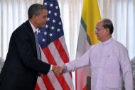 US President Barack Obama shakes hands with Myanmar's President Thein Sein (R) after a meeting at the regional parliament building in Yangon, on November 19. Obama met Myanmar's reformist leader during a landmark visit to Yangon aimed at encouraging political reforms