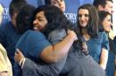 Amber Vinson hugs caregivers before her release from Emory University Hospital in Atlanta