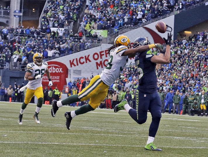 Seattle Seahawks&#39; Jermaine Kearse catches the game winning touchdown pass during overtime of the NFL football NFC Championship game against the Green Bay Packers Sunday, Jan. 18, 2015, in Seattle. The Seahawks won 28-22 to advance to Super Bowl XLIX