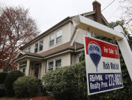 <p>               In this Nov. 16, 2011 photo, a for sale sign hangs in front of a home, in Milton, Mass. Existing-home sales improved in October while the number of homes on the market continued to decline, according to the National Association of Realtors(R). (AP Photo/Steven Senne)