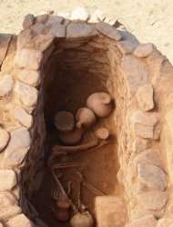 This handout picture released by the Italian archaeological mission shows a skeleton in an ancient grave in Udegram, in northwestern Pakistan's Swat Valley. Swat was formerly known as the Switzerland of Pakistan for its stunning mountains, valleys and rivers