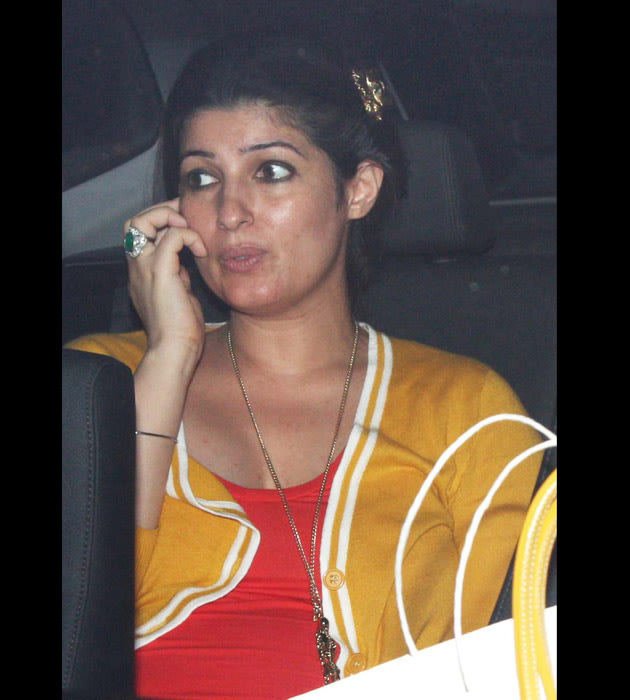 Twinkle khanna talking on the phone in the car - (4) -  Twinkle khanna Latest pics