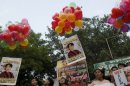 Myanmar exiles in India celebrate Aung San Suu Kyi's release in 2010