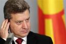 Macedonia's President Gjorge Ivanov listens during a news conference in Riga
