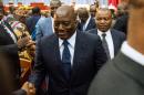 Opponents of Congolese President Joseph Kabila (C) accuse him of delaying the presidential vote in the hope of tweaking the constitution to extend the Kabila family's hold over the nation