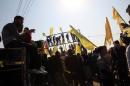 Waving Fatah's yellow flags young supporters of Palestinian president Mahmud Abbas's party hold rally in Gaza on January 4, 2013