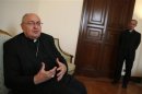 Cardinal Sandri gestures during an interview with Reuters in Rome