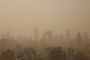 Photographs: Sandstorm hits China