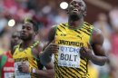 Jamaica's Usain Bolt reacts after winning a men's 200-meter semifinal at the World Athletics Championships in the Luzhniki stadium in Moscow, Russia, Friday, Aug. 16, 2013. (AP Photo/Ivan Sekretarev)