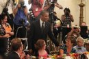 U.S. President Obama greets guests at "Kids' State Dinner in Washington