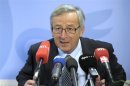 Luxembourg's Prime Minister Juncker addresses a news conference during a European Union leaders summit in Brussels