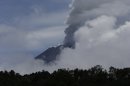 Mexico volcano spits 2 mile-high ash cloud
