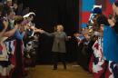 Democratic presidential candidate Hillary Clinton greets supporters as she arrives to speak at Abraham Lincoln High School in Des Moines, Iowa on January 31, 2016, one day before the much anticipated state caucuses