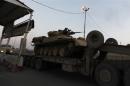 A tank is transported towards Anbar, to reinforce Iraqi troops in the province, west of Baghdad