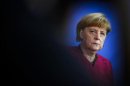 German Chancellor Angela Merkel attends handover ceremony of annual NKR report in Berlin