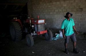 Talent Cele, a new farmer, is seen at his farm outside&nbsp;&hellip;