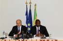 Mali's Foreign Minister Tieman Hubert Coulibaly and France's Foreign Affairs Minister Laurent Fabius attend a news conference in Bamako