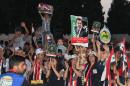 In this Saturday, May 31, 2014, photo released by the Syrian official news agency SANA, supporters of Syrian President Bashar Assad hold his portraits and wave Syrian flags during a demonstration in support of his candidacy for presidential election in the costal city of Tartous, Syria. It is Syria's first multi-candidate presidential election in nearly half a century. But the vote on Tuesday, June 3, still has the feel of a referendum and is being touted by Assad's government as a measuring scale for Syrians' support of his three-year brutal military crackdown on dissent. (AP Photo/SANA)