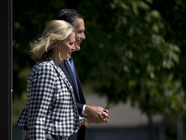 Republican presidential candidate and former Massachusetts Gov. Mitt Romney and his wife Ann leave the Church of Jesus Christ of Latter-day Saints after church service on Sunday, Aug. 26, 2012, in Wolfeboro, N.H. (AP Photo/Evan Vucci)
