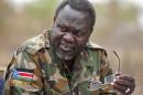 South Sudan's rebel leader Riek Machar speaks to rebel General Peter Gatdet Yaka in a rebel controlled territory in Jonglei State