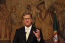 Germany's Foreign Minister Guido Westerwelle gestures during a news conference at Palacio das Necessidades in Lisbon