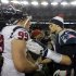 New England Patriots quarterback Tom Brady, right, talks with Houston Texans defensive end J.J. Watt following their AFC divisional playoff NFL football game in Foxborough, Mass., Sunday, Jan. 13, 2013. The Patriots defeated the Texans 41-28. (AP Photo/Charles Krupa)