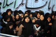 Iranian women listen to a speech by President Mahmoud Ahmadinejad at Ayatollah Ruhollah Khomeini's mausoleum in Tehran last week. Women in Iran are being banned from watching live public screenings of Euro 2012 football games because of an "inappropriate" environment where men could become rowdy, a deputy police commander said Sunday