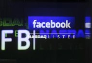 The Facebook logo is seen on a screen inside at the Nasdaq Marketsite in New York May 18, 2012. REUTERS/Shannon Stapleton