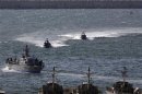 Israeli naval vessels head into port in Ashdod