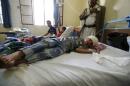 A boy injured in one of Friday's suicide bomb attacks lies on a hospital bed in Sanaa