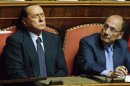 Italy's former Prime Minister Berlusconi closes his eyes during a vote session at the Senate in Rome