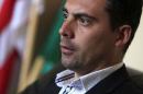 Vona, chairman of the far right Jobbik party, speaks during an interview with Reuters in Budapest