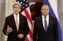 Russia's Foreign Minister Sergey Lavrov, right, and U.S. Secretary of State John Kerry address the media before a meeting in Vienna, Austria, Saturday Nov.14, 2015. Foreign ministers from more than a dozen nations have begun meeting in Vienna seeking to find a way to resolve the conflict in Syria. (Leonhard Foeger/Pool Photo via AP)