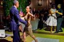 Obamas bust out smooth tango moves in Argentina
