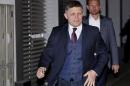 Slovakia's Prime Minister and leader of Smer party Robert Fico arrives at his party's headquarters to check on the results of the country's parliamentary election in Bratislava