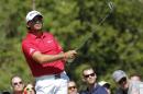 Jason Day, of Australia, watches his tee shot on the third hole during the second round of the Deutsche Bank Championship golf tournament in Norton, Mass., Saturday, Aug. 30, 2014. (AP Photo/Stew Milne)