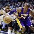 Memphis Grizzlies' Rudy Gay, left, and Los Angeles Lakers' Kobe Bryant (24) battle for a loose ball during first half of an NBA basketball game in Memphis, Tenn., Wednesday, Jan. 23, 2013. (AP Photo/Daniel Johnston)