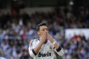 German midfielder Mesut Ozil celebrates after scoring at the Santiago Bernabeu stadium in Madrid on April 20, 2013