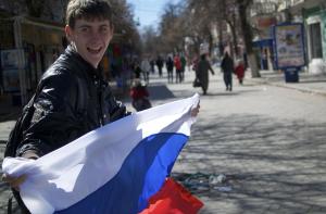 A local teenager waves with Russian flag in a street&nbsp;&hellip;