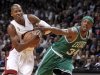 Boston Celtics forward Paul Pierce fouls Miami Heat guard Ray Allen in the first half of their NBA basketball game in Miami, Florida
