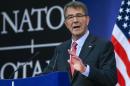 U.S. Secretary of Defense Ash Carter speaks at a news conference during a NATO Defence Ministers meeting at the Alliance's headquarters in Brussels