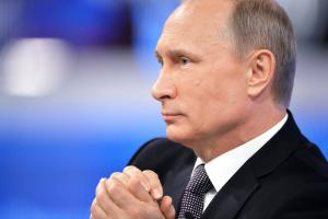 Russian President Vladimir Putin listens during an &hellip;